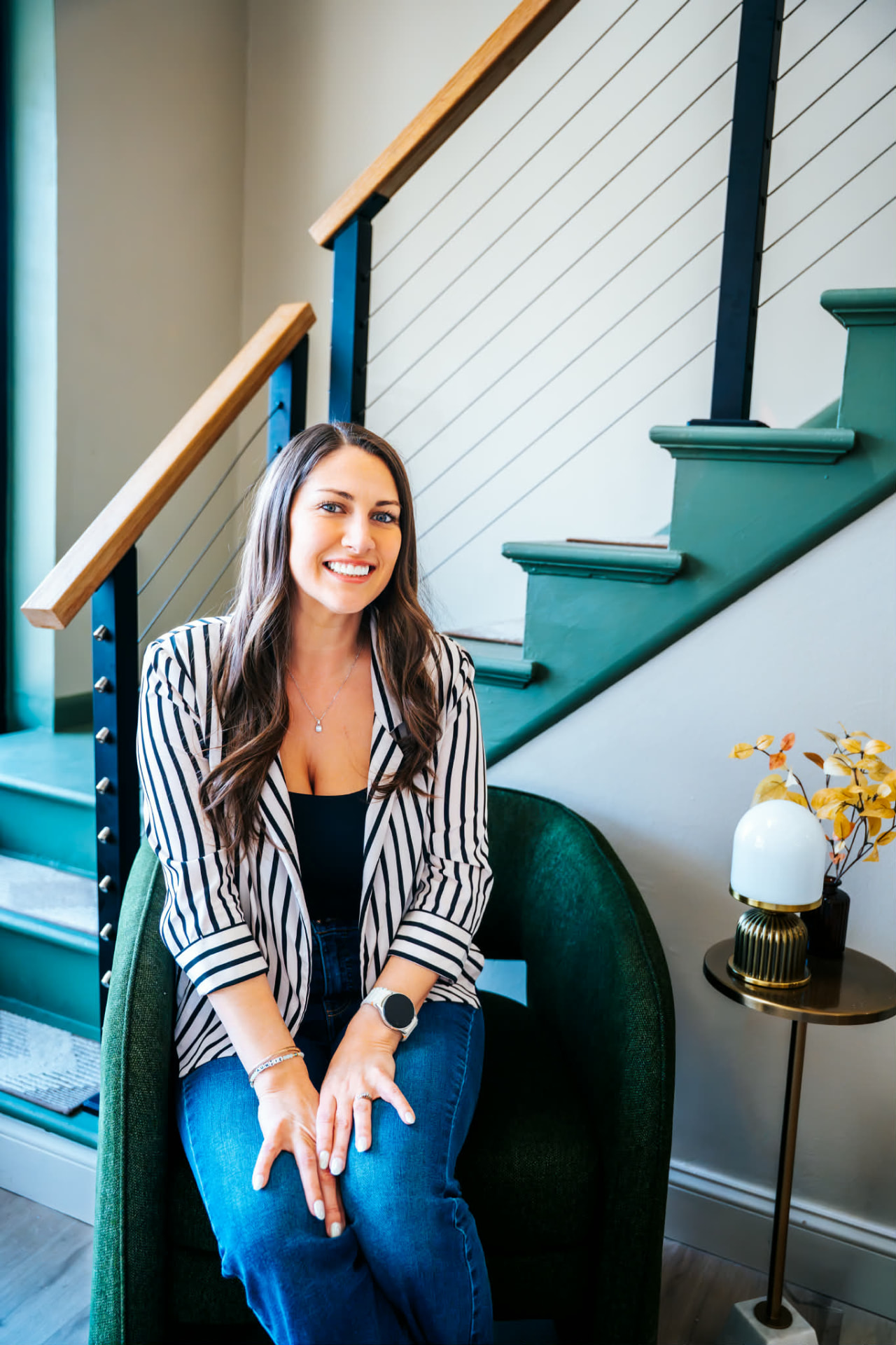 Danielle Strickler seated in a modern Michigan home